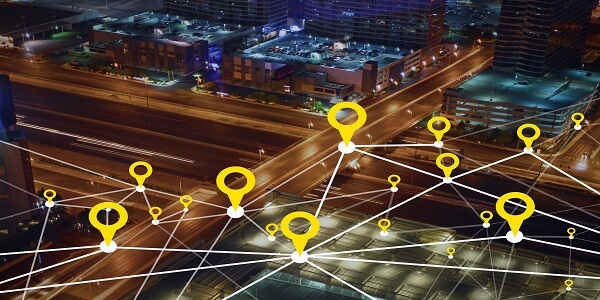 City map with location pins and connections, showing how geofencing targets nearby customers to boost promotional campaigns.