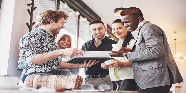 Marketing team discussing loyalty to cut CAC