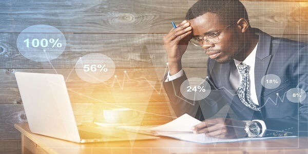 Bank marketer analyzing data to leverage cognitive biases