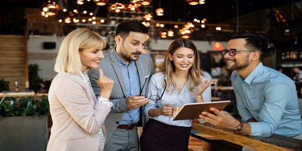 Team reviewing customer insights data to boost sales and conversions