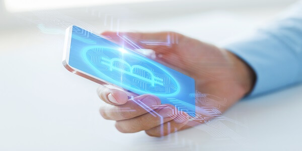 Male hand holding a transparent smartphone displaying a Bitcoin icon, representing the theme ‘Leveraging the Power of Crypto Loyalty Programs to Build a Loyal Community.