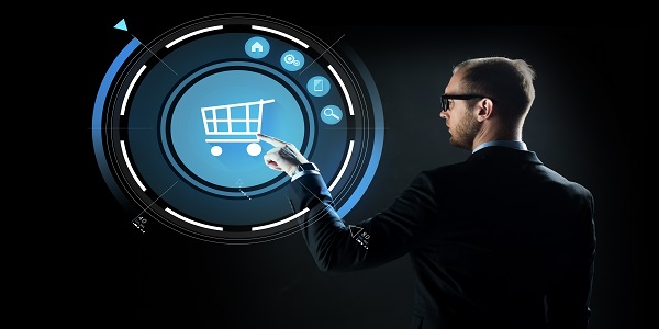 Business professional interacting with a digital shopping cart icon, representing futuristic retail technology and emerging retail trends for 2024.