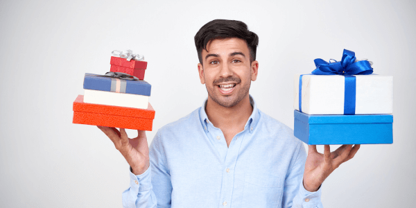 man-holding-heap-gifts